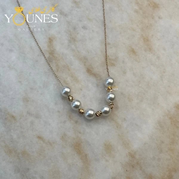 گردنبند مروارید و گوی طلا